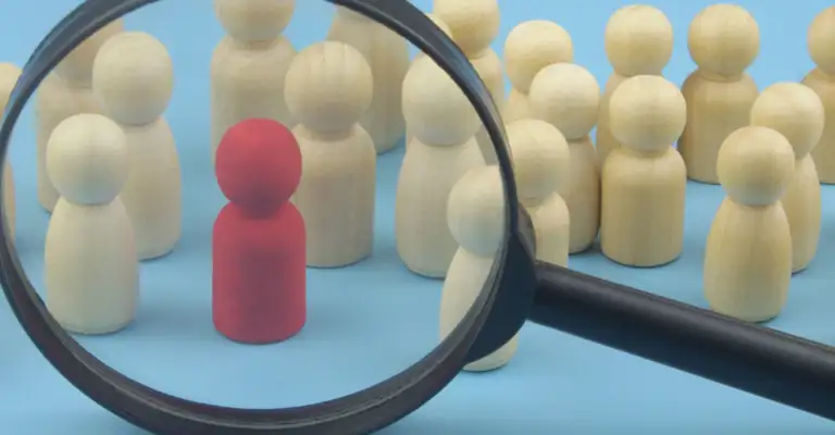 Magnifying Glass Wooden People One Red Web Banner (1)